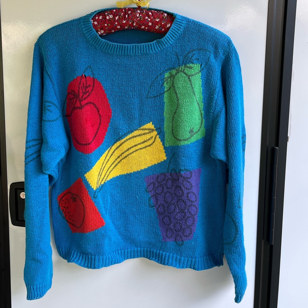 Long sleeve turquoise sweater by Icarus in size medium